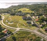 Flygvy över platsen där bostadsrättsföreningen Amundö Äng skapas. Foto: Flodéns