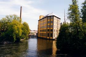Centrala Norrköping med en av de mest kända gamla industribyggnaderna från textileran i Motala ström. Foto: Colourbox Centrala Norrköping med en av de mest kända gamla industribyggnaderna från textileran i Motala ström. Foto: Colourbox